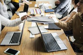 colleagues at work table in the office