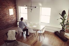 Guy alone in room