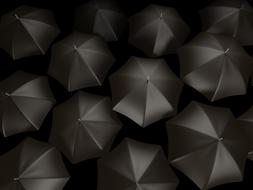 black umbrellas on a black background