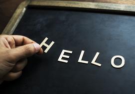 hello as a letters on black chalkboard