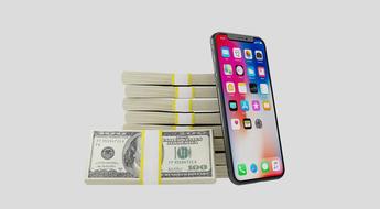 iphone x and a stack of dollars