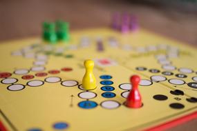 Colorful figures on the colorful game board, with the circles