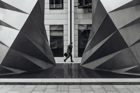 Building and Businessman grey