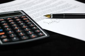 calculator and signed contract