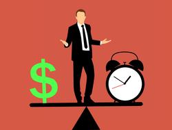 balancing businessman between money and time