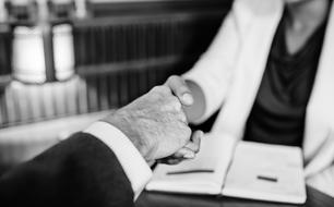 Achievement Agreement Business hand