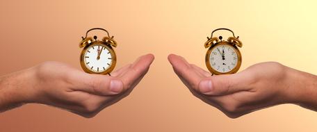 alarm clocks on the palms