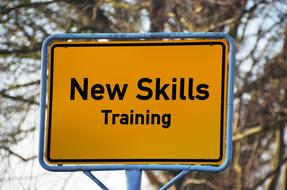 orange road sign train new skills