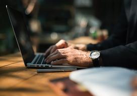 Man Hand and laptop