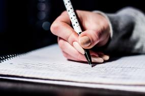 woman writing notes