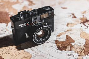 retro camera on the world map