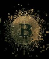 golden bitcoin on a black background