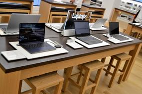 Laptops on desk in store