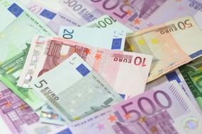photo of multi-colored euro bills