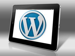 Logo of Wordpress on the tablet