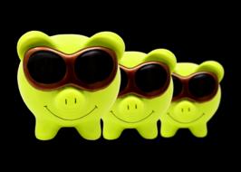 yellow ceramic piggy bank with sunglasses