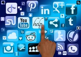 Touching the different icons of Social Medias clipart