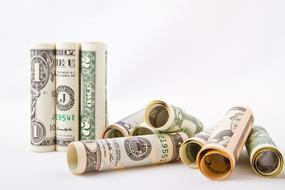Dollar rolls on white background