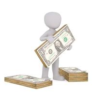 painted white man holds a stack of dollars