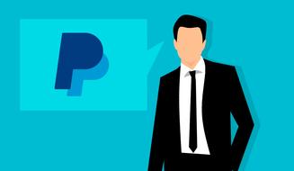 businessman with thought bubble with paypal logo