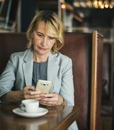business girl in a cafe at the table