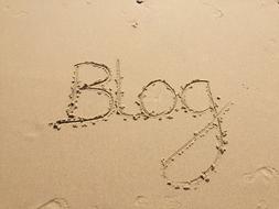 Blog, writing on wet sand