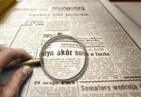 Newspaper Magnifying Glass text