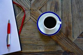 Coffee Cup and red pen