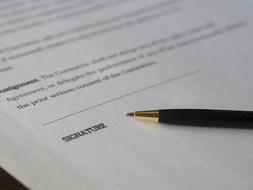 pen to sign a contract