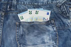 euro money in jeans pocket