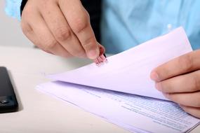 closeup picture of Boy with paper