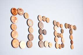 Debt word with Euro Coins