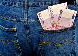 Euro banknotes in a back pocket of Jeans