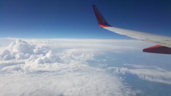 plane in a cloudy sky