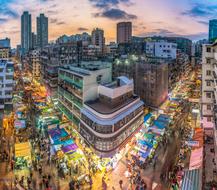 top view of street market in city at dusk