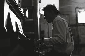 Guy Business piano