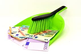 Euro banknotes on a scoop