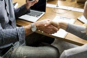 Reaching An Agreement hands