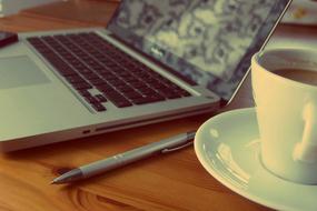 Macbook with coffe Computer