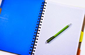 blue Notebook and green Pencil