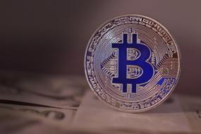 Bitcoin blue gold icon