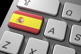 computer button with Spanish flag