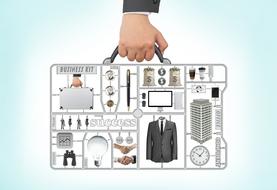business kit in a man's hand as an illustration