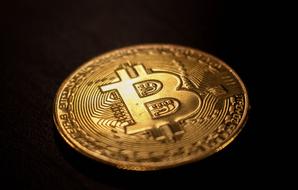 golden bitcoin on the black background