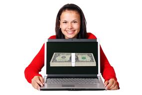 make money online, motivator, happy girl with pack of money and laptop