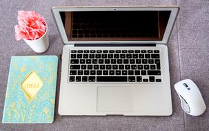 Laptop with wireless Mouse on desk