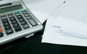 accounting documents and calculator