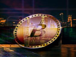 Bitcoin on the background of the night megalopolis