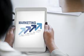 marketing analysis on the tablet screen