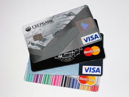 four bank cards on white